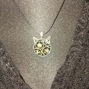 Perfect for cat lovers? Steampunk type geared cat shaped necklace.